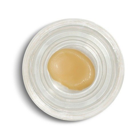 Golden wax cannabis concentrate close up
